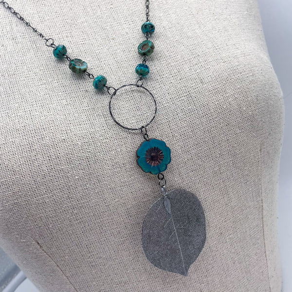 Teal Hibiscus Flower & Gun Metal Leaf Necklace