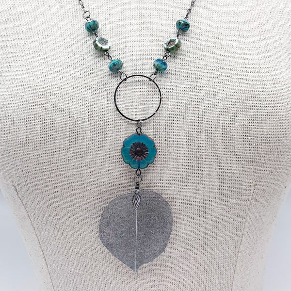 Teal Hibiscus Flower & Gun Metal Leaf Necklace