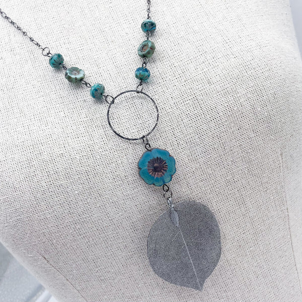 Teal Hibiscus Flower & Gun Metal Leaf Necklace